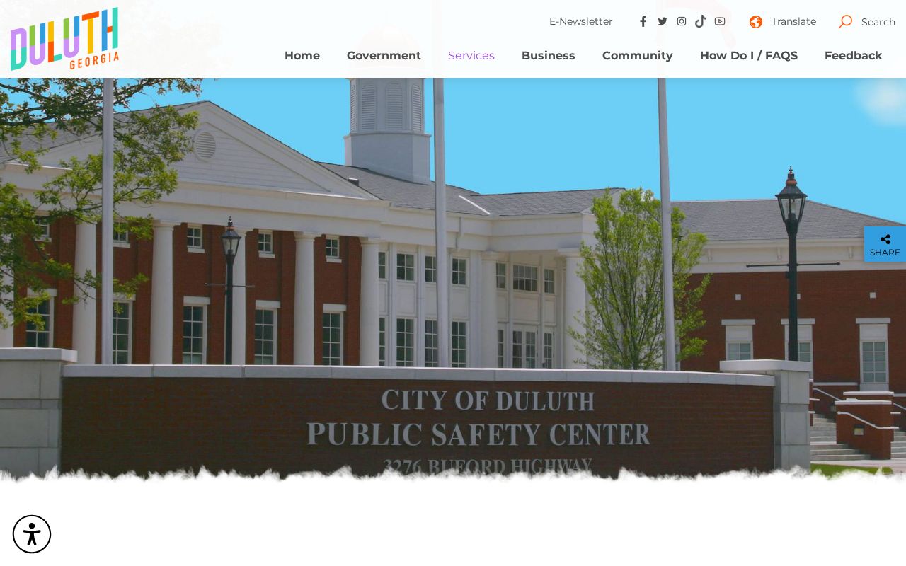 Duluth Police Department records page for Gwinnett County arrest reports and booking records